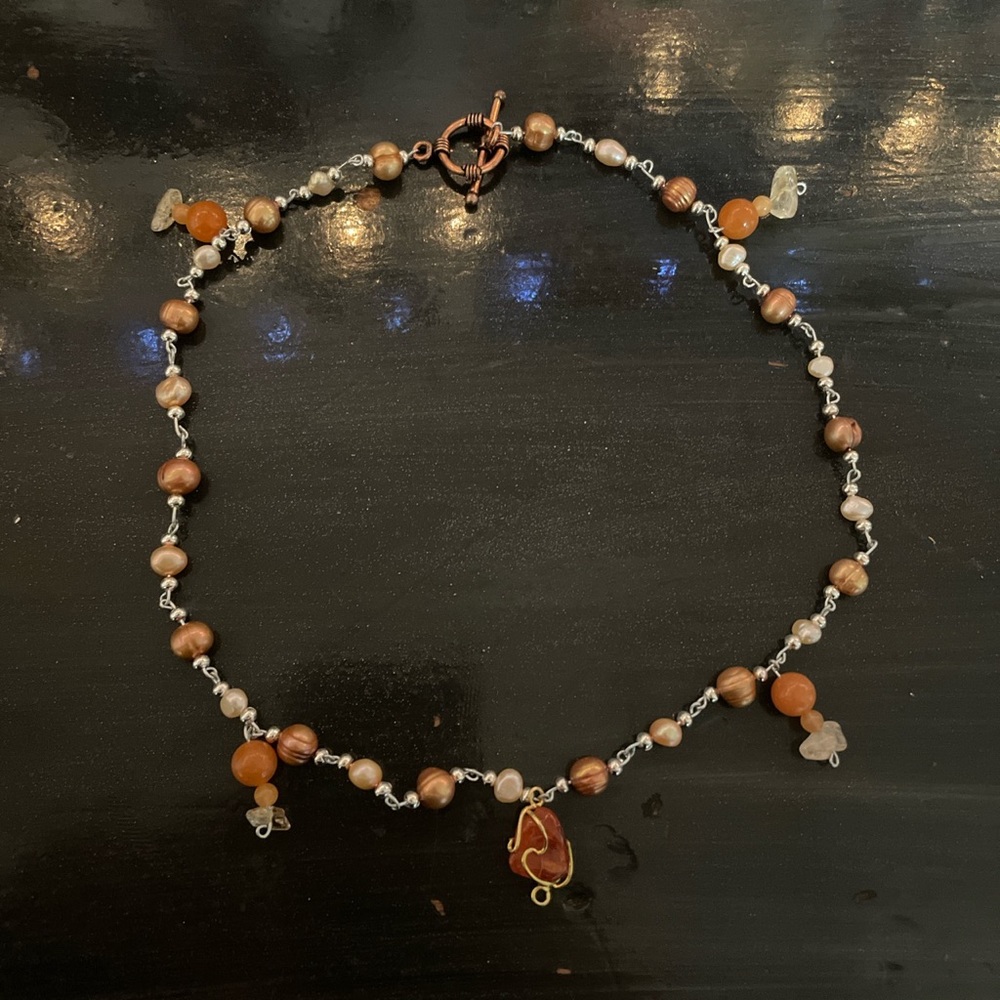 hand-made orange and white pearl necklace with pendant